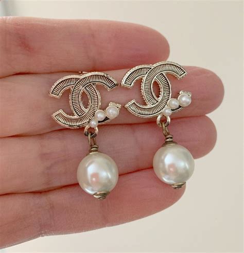 chanel logo pearl drop earrings|authentic chanel pearl earrings.